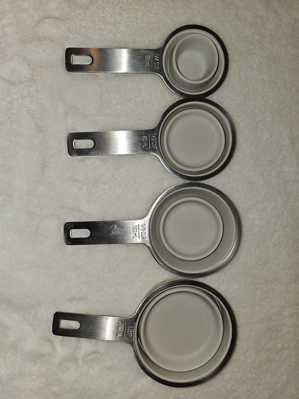 Silicone-Lined Stainless Steel William Sonoma Measuring Cups. 1/4  1/2  3/4  1